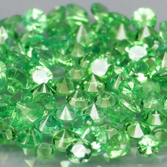 Rare 3.76ct untreated spring green Tsavorite set