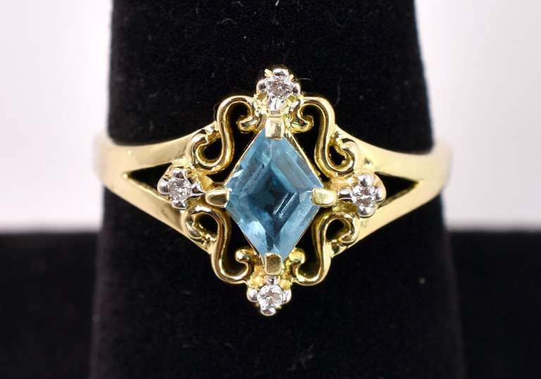 Brilliant Blue Topaz and Diamond Ring in 14K Yellow Gold
