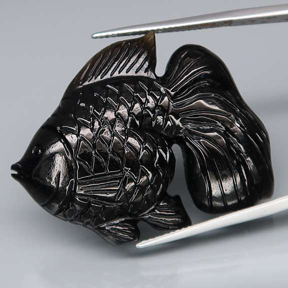 Simply adorable 50.82ct Tektite fish carving