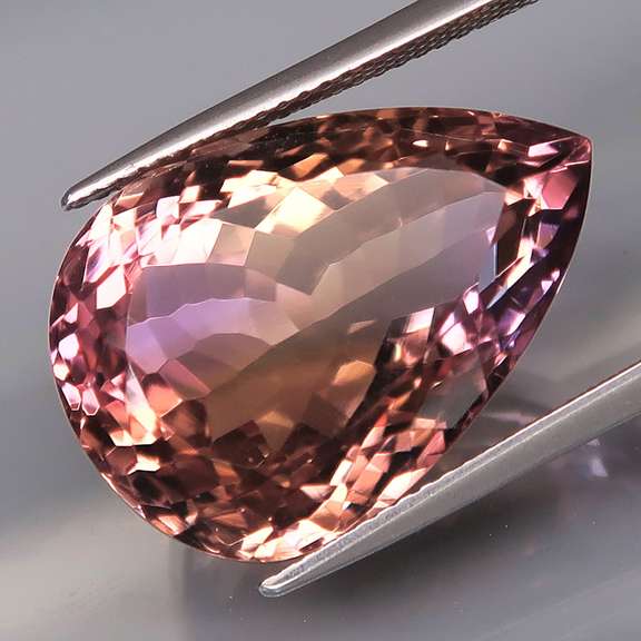Elegant 23.91ct pear cut Bolivian Ametrine