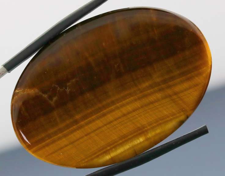 Full body shimmer! 75.44ct Golden Tiger Eye cabochon