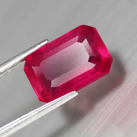 Gorgeous 3.47ct emerald cut Ruby center stone