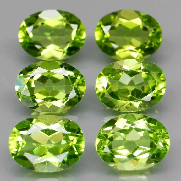 Dazzling 8.70ct untreated apple green Peridot set