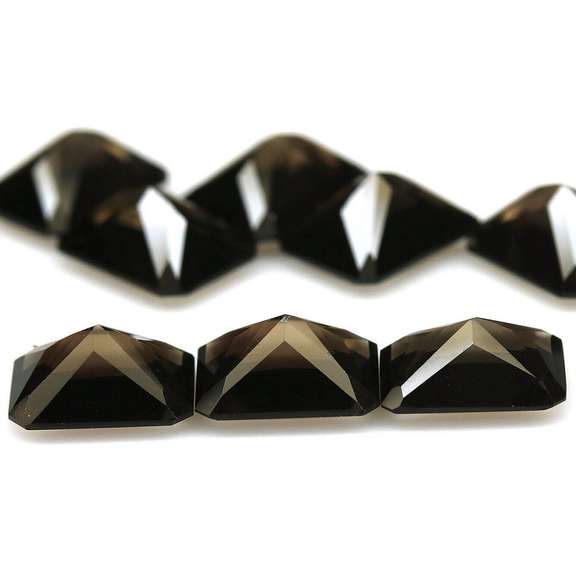 Emerald cut! Unheated! 15.07ct Smoky Quartz set