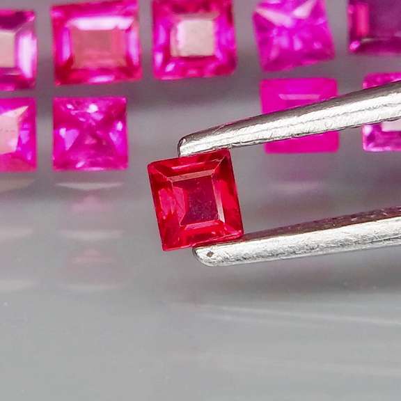 Outstanding 4.52ct 55 piece princess cut Ruby set