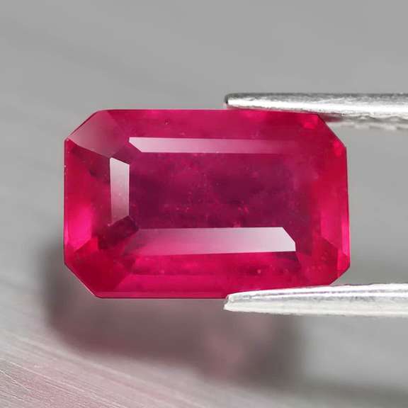 Gorgeous 3.47ct emerald cut Ruby center stone