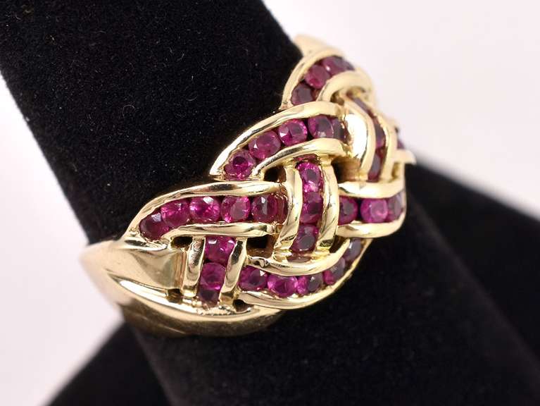 Lovely Ruby Braid Style Ring in Yellow Gold