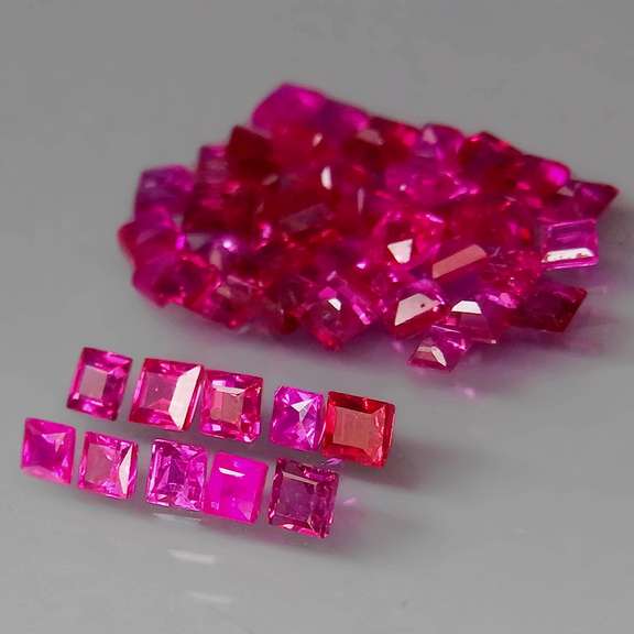 Outstanding 4.52ct 55 piece princess cut Ruby set