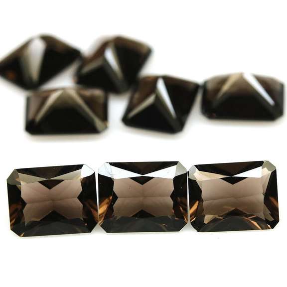 Emerald cut! Unheated! 15.07ct Smoky Quartz set