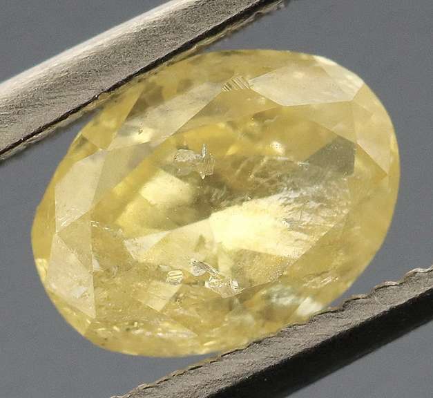 Rare .48ct oval cut yellow Diamond