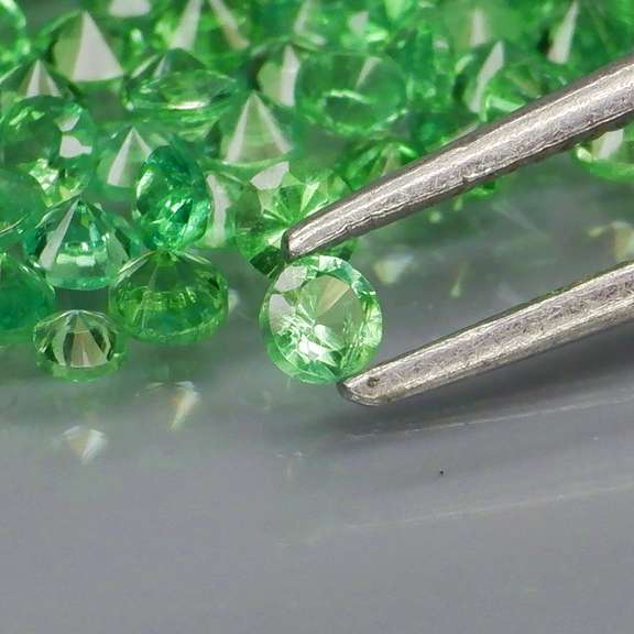 Tremendous 3.92ct untreated spring green Tsavorite set