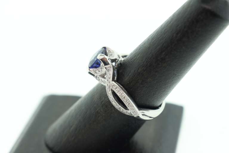 LADIES 18K WHITE GOLD SAPPHIRE AND DIAMOND RING