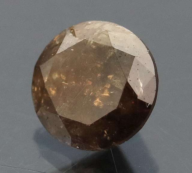 Rich .78ct smooth cut Chocolate Diamond solitaire