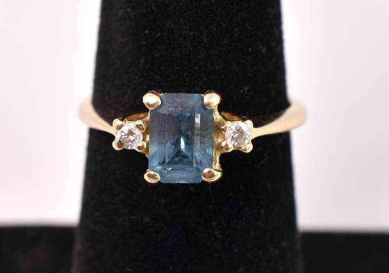 Elegant Blue Topaz and Diamond Ring in 14K Yellow Gold