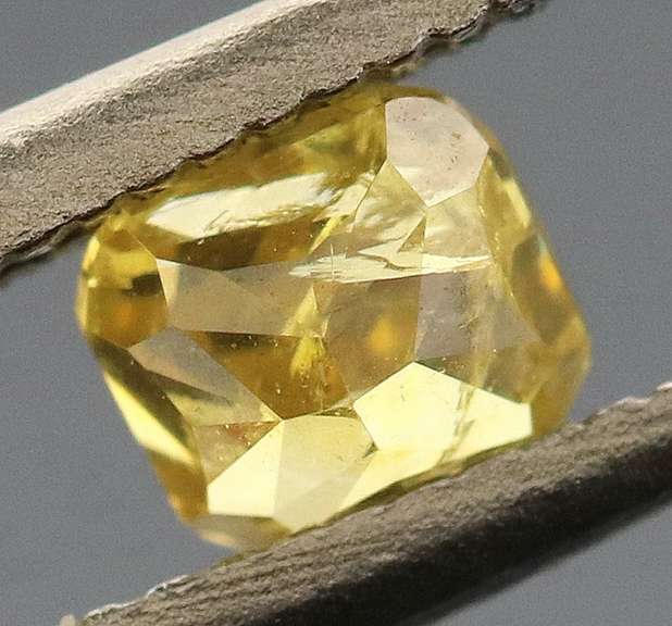 Eye catching .23ct cushion cut golden Diamond