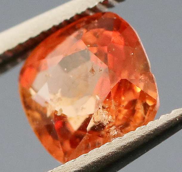 Incredible .86ct open color blood orange Spinel