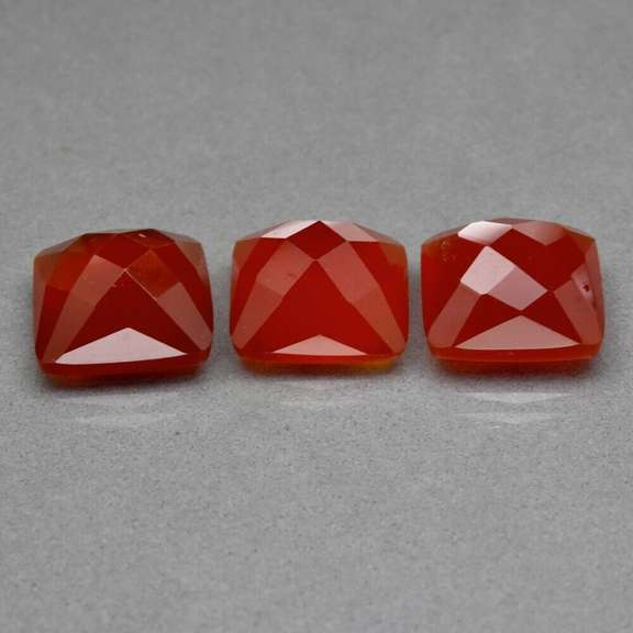 Glowing 22.82ct untreated blood orange Chalcedony set