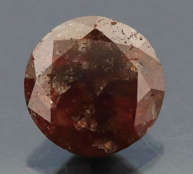 Eye catching 1.18ct round cut red Diamond solitaire