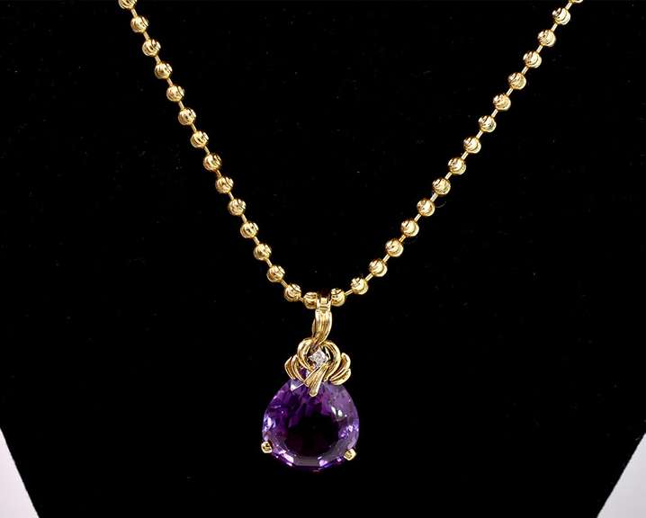 Glamorous Amethyst and Diamond Pendant Necklace in 14K Yellow Gold