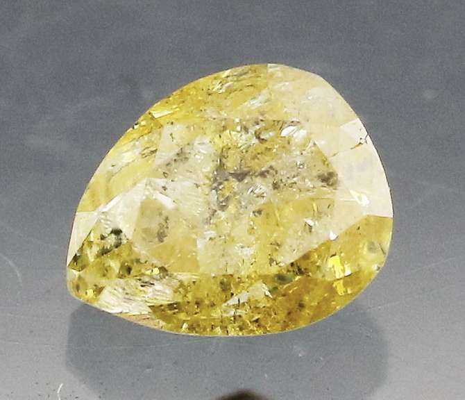 Rare .25ct pear cut yellow Diamond