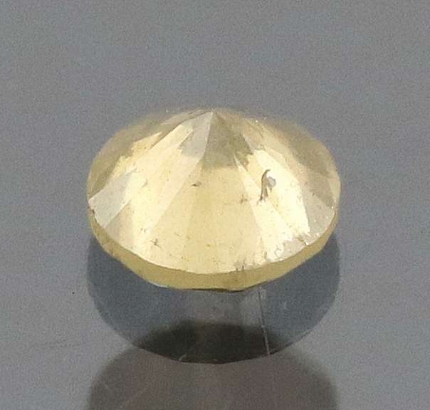Elegant .20ct silvery yellow Diamond solitaire