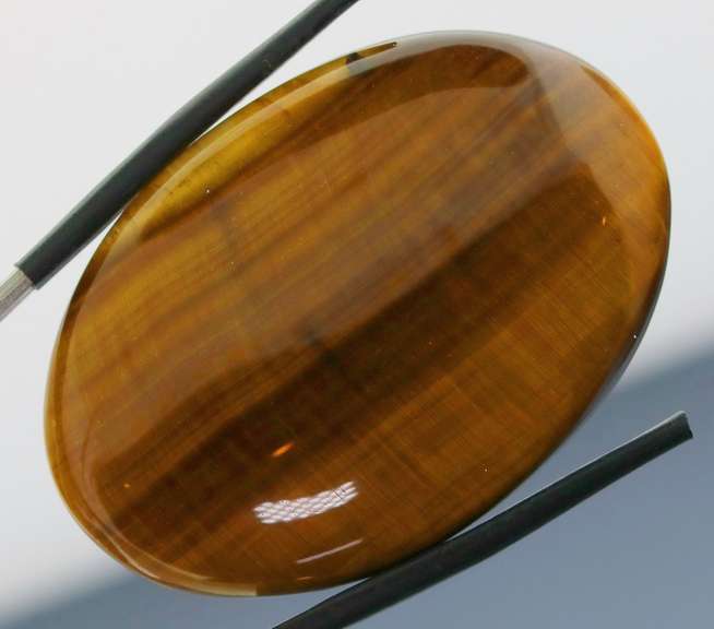 Full body shimmer! 75.44ct Golden Tiger Eye cabochon