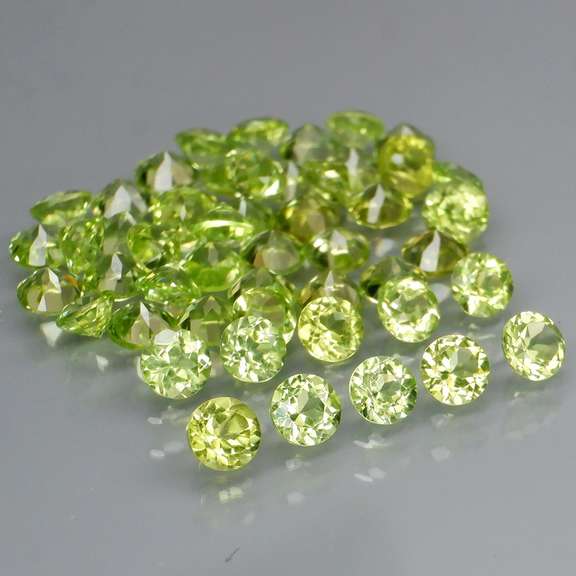 Fantastic 6.25ct 3mm round cut Peridot set
