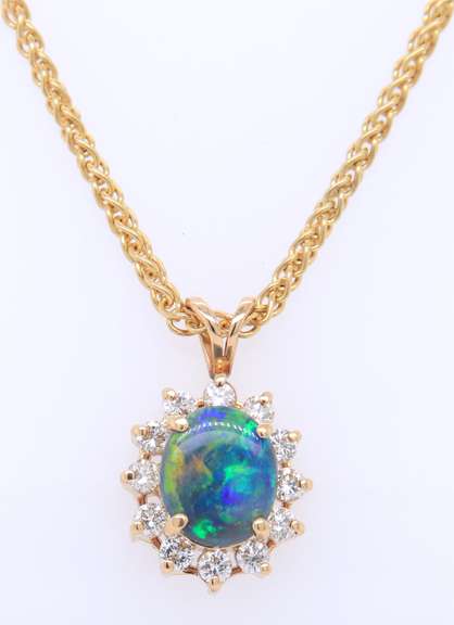 Pleasing Yellow Gold Oval Opal and Diamond Pendant on Wheat Chain