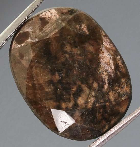 Huge untreated 23.30ct earth toned faceted Sapphire