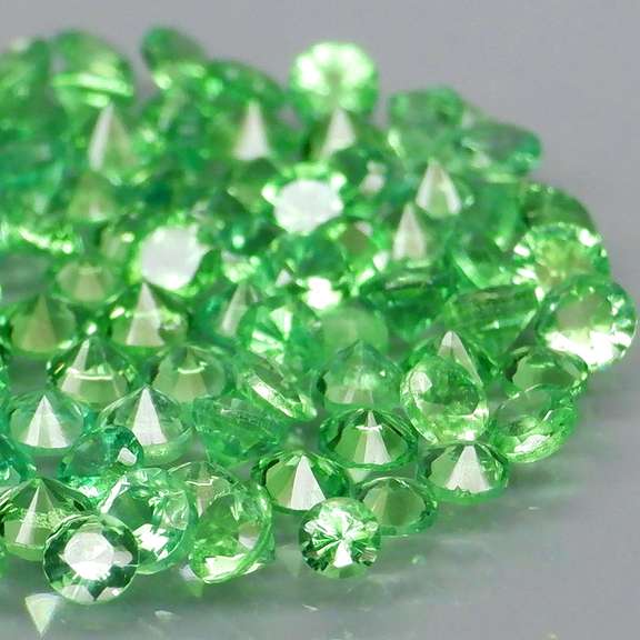 Tremendous 3.92ct untreated spring green Tsavorite set