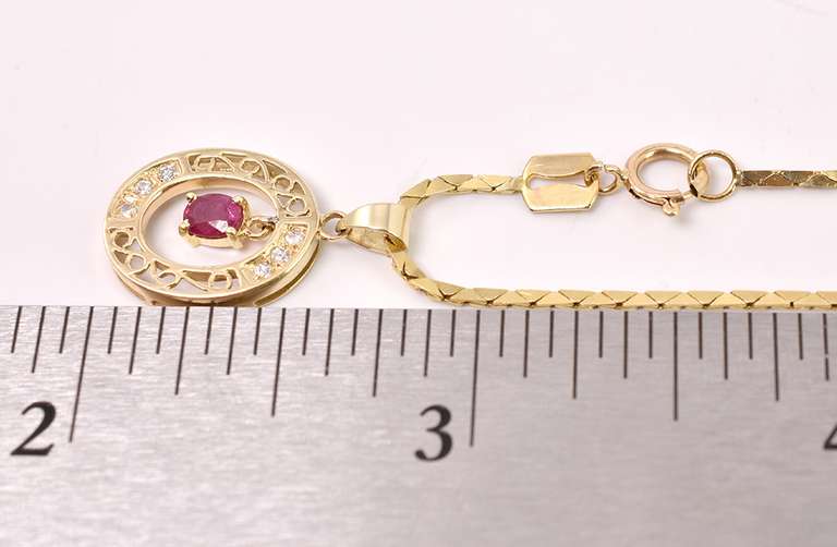 Elegant Ruby and Diamond Pendant Necklace in 14K Yellow Gold