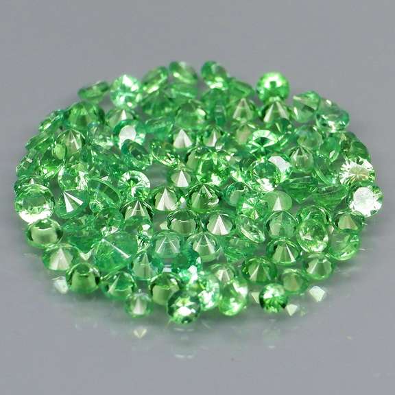 Tremendous 3.92ct untreated spring green Tsavorite set