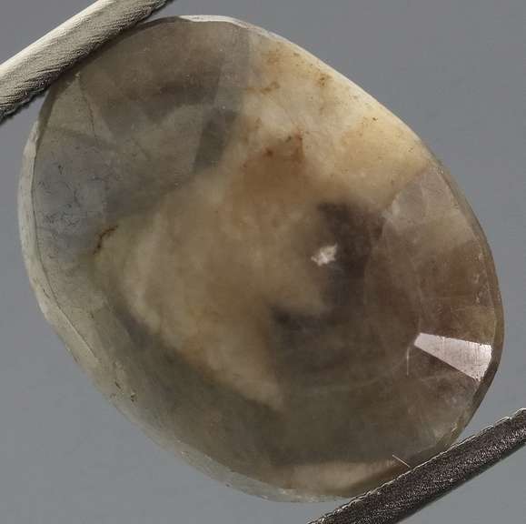 UNTREATED! 6.78ct steely faceted Sapphire