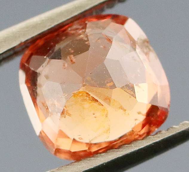 Incredible .86ct open color blood orange Spinel