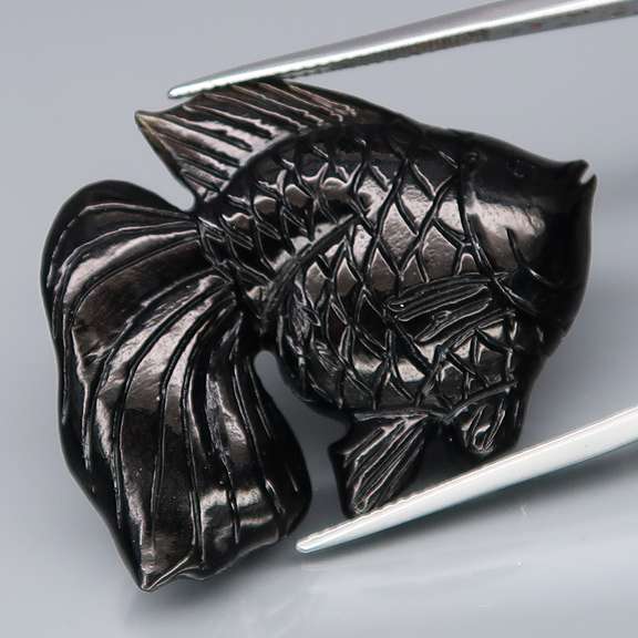 Simply adorable 50.82ct Tektite fish carving
