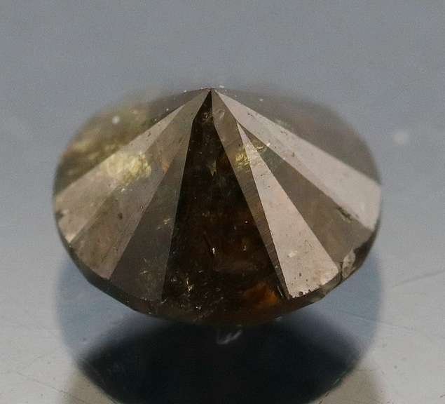 Glistening .76ct black calico Diamond solitaire