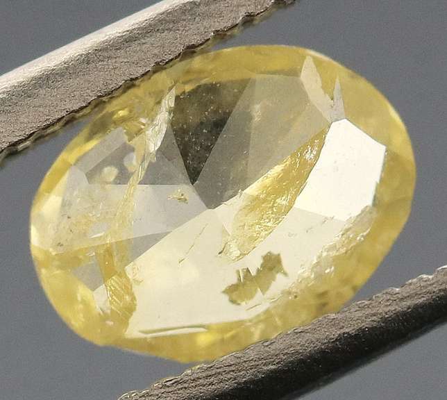 Rare .48ct oval cut yellow Diamond