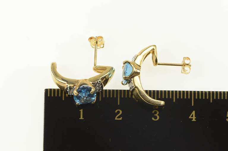 10K Yellow Gold Oval Blue Topaz Diamond Accent Curved Earrings