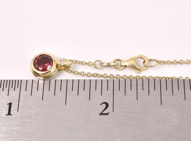 Brilliant Bezel Garnet Pendant Necklace in 14K Yellow Gold
