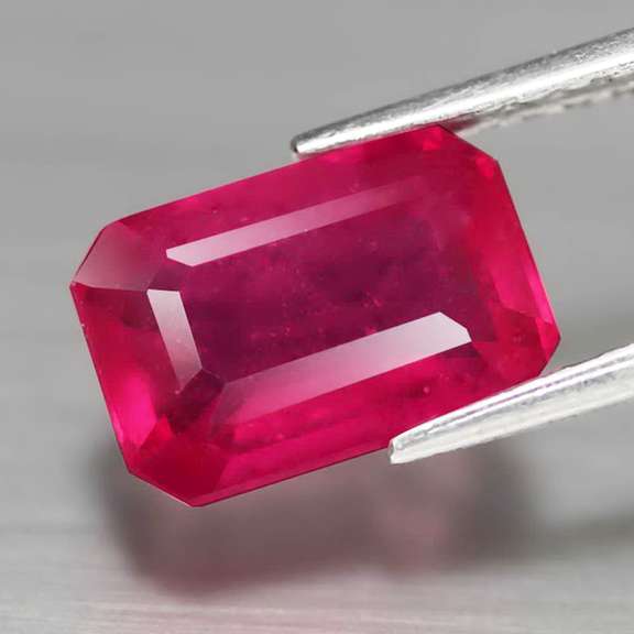 Gorgeous 3.47ct emerald cut Ruby center stone