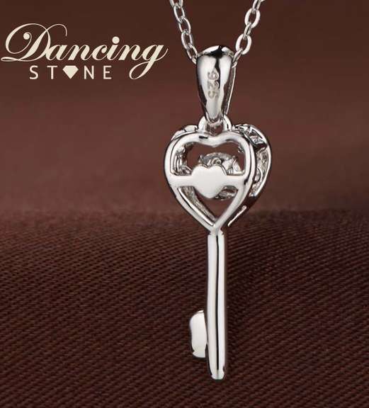 Elegant heart key pendant with center Stone dancing
