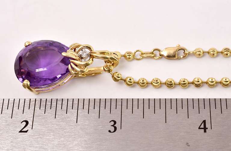 Glamorous Amethyst and Diamond Pendant Necklace in 14K Yellow Gold