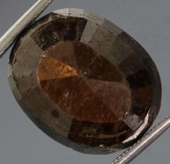 UNTREATED! Shimmering 16.47ct earth toned faceted Sapphire