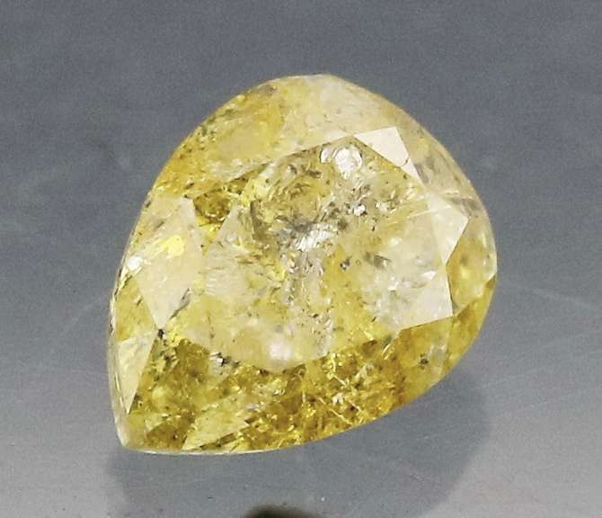Rare .25ct pear cut yellow Diamond