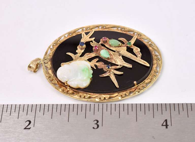 Ornate Chinese Themed Black Stone Pendant in 14K Yellow Gold with Jade, Sapphires, and Rubies