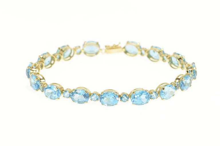 14K Yellow Gold Oval Blue Topaz Statement Classic Bracelet
