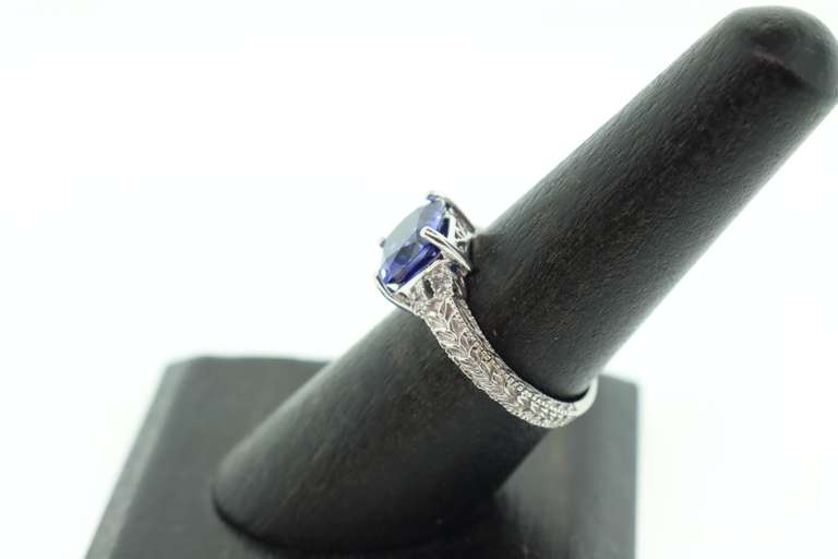 LADIES WHITE GOLD TANZANITE AND DIAMOND RING