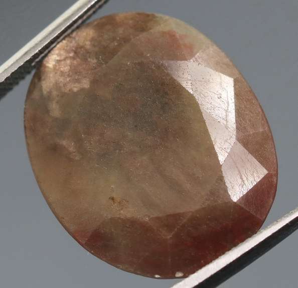 Unbelievable 18.46ct earth toned faceted Sapphire