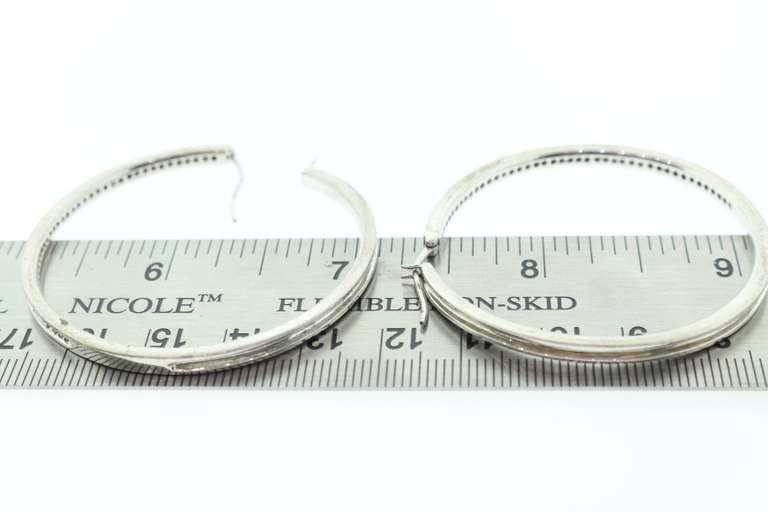 LADIES LARGE STERLING AND DIAMOND LOOP EARRINGS