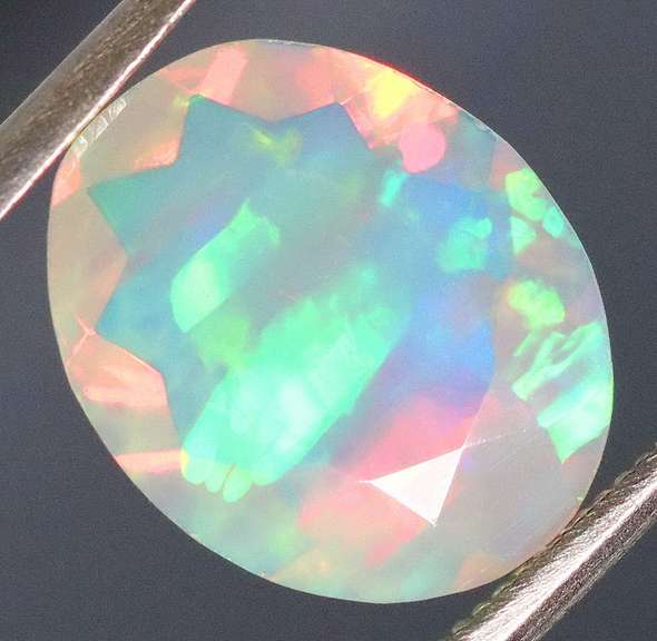 Captivating 1.70ct fully faceted fairy fire jelly Opal